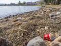 Chalkida, Evia island. July 2019: Panoramic view of the city beach of Liani Ammos with tourists and Gypsies, polluted with garbage