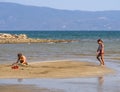 Chalkida, Evia island. July 2019: Panoramic view of the city beach of Liani Ammos with tourists and Gypsies, polluted with garbage