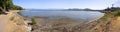 Chalkida, Evia island. July 2019: Panoramic view of the city beach of Liani Ammos with tourists and Gypsies, polluted with garbage