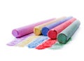 Chalks in a variety of colors arranged on a white background