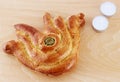 Challah bread shaped as good fortune symbol