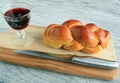 Challah bread wine in glass on board Royalty Free Stock Photo