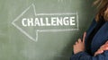 CHALLENGE. Arrow with text on a green chalk board Royalty Free Stock Photo