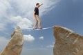 Challenge concept. Man walking on wire Royalty Free Stock Photo