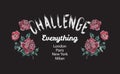 Challenge Slogan with embroidered red roses.