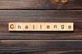 CHALLENGE word written on wood block. CHALLENGE text on wooden table for your desing, concept Royalty Free Stock Photo