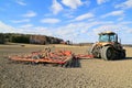 Challenger MT765C Tracked Tractor and Cultivator on Field