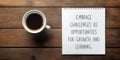 Motivational flat lay notepad and coffee, embrace challenges as opportunities for growth and learning Royalty Free Stock Photo