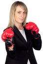 Challenging business woman with boxing gloves Royalty Free Stock Photo