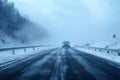 Challenging conditions poor visibility on a snow covered winter highway Royalty Free Stock Photo