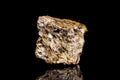 Chalybite, siderite or iron spar ore, raw rock on black background, mining and geology