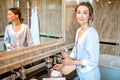 Chambermaid in the hotel bathroom