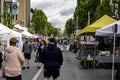 food truck festival on main street of small town on spring day