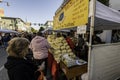 Women buying kettle pop corn at street festival