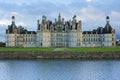 Chambord palace after rain at sunset, Loire Valley, France Royalty Free Stock Photo