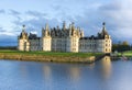 Chambord palace after rain at sunset, Loire Valley, France Royalty Free Stock Photo