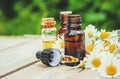 Chamomile extract in a small bottle. Royalty Free Stock Photo