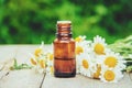 Chamomile extract in a small bottle. Royalty Free Stock Photo