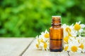 Chamomile extract in a small bottle. Royalty Free Stock Photo