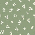 Chamomile floral mille fleur seamless pattern on green background. Small summer flowers in simple scandinavian cartoon