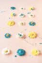 Chamomile flowers with dripping blue and yellow paint Royalty Free Stock Photo