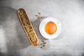 Chamomile tea cup with loose flowers or dried petals ongray table. Top view - above Royalty Free Stock Photo