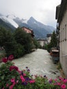 CHAMONIX MONT BLANC european village and high alpine mountains range landscape in french ALPS at cloudy day - vertical Royalty Free Stock Photo