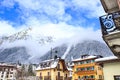 Chamonix town with snowy mountains on the background.