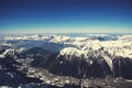 Chamonix valley panoramic aerial view from Aiguille du Midi mountain peak. Popular touristic destination. Royalty Free Stock Photo