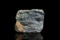 Chamosite ore, raw rock on black background, mining and geology