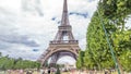 Champ de Mars and the Eiffel Tower timelapse in a sunny summer day. Paris, France