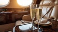 champagne on board a private jet. a flight on the board of a business class plane and two flutes of champagne. Toast in private Royalty Free Stock Photo
