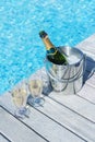 Champagne bottle in bucket and two glasses of champagne Royalty Free Stock Photo