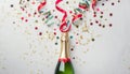 Champagne bottle with confetti stars and party streamers on white festive background. Christmas, birthday or wedding concept. Flat Royalty Free Stock Photo