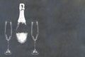 Champagne bottle with flutes