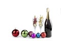 The champagne bottle and champagne glass with Christmas decorations Royalty Free Stock Photo