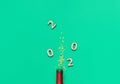 Champagne bottle and golden strars glitter on green bavkground. banner for christmas, birthday