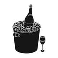 Champagne bottle in an ice bucket icon in black style isolated on white background. Royalty Free Stock Photo