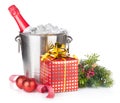 Champagne bottle in ice bucket, two empty glasses and christmas Royalty Free Stock Photo