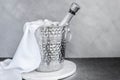 Champagne bottle in silver bucket with ice Royalty Free Stock Photo