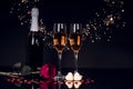 Champagne bottle with two wine glasses and red rose Royalty Free Stock Photo