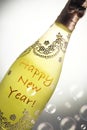 Champagne bottle very nicely decorated with the message Happy New Year Royalty Free Stock Photo