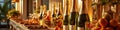 Champagne bottles and fruit on elegant buffet table in luxurious event setting Royalty Free Stock Photo
