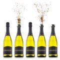 Champagne bottles with popping corks isolated