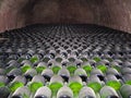 Champagne bottles stored in a cellar Royalty Free Stock Photo