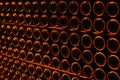 Champagne bottles in wine cellar. Royalty Free Stock Photo