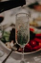 Champagne with bottlle on the wedding restaurant table Royalty Free Stock Photo