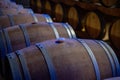 Champagne brut sparkling wine production in oak wooden barrels in underground cellar, Reims, Champagne, France