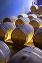 Champagne brut sparkling wine production in oak wooden barrels in underground cellar, Reims, Champagne, France