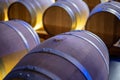 Champagne brut sparkling wine production in oak wooden barrels in underground cellar, Reims, Champagne, France